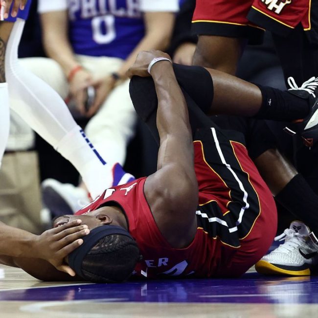 Heat’s Jimmy Butler injures knee in play-in loss, set for MRI
